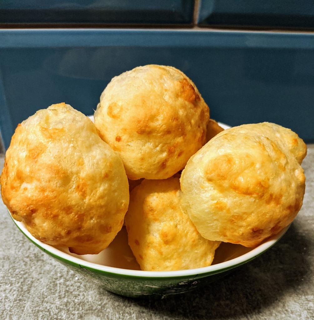 A bowl of golden dough balls 