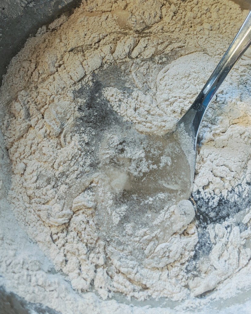 The psyllium forms a gel with the water helping to bind the dough.