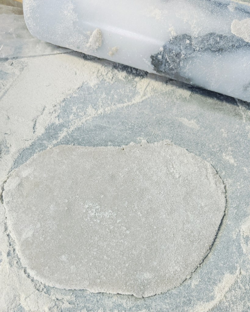 Roll each circle into as thin a circle or oval that you possibly can (1mm-2mm).